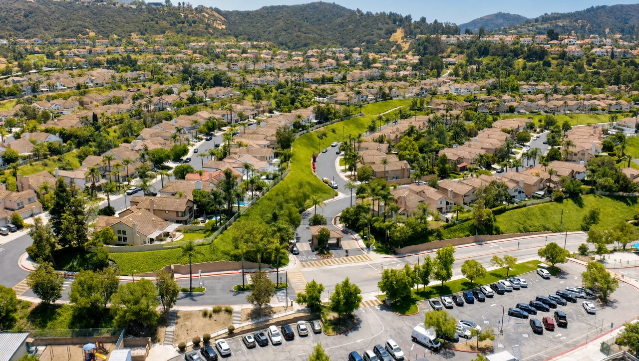 Aerial view of a Calabasas Hills residential neighborhood near a school pickup and drop-off area