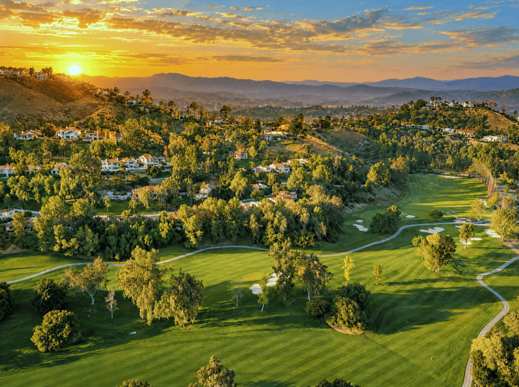 Rolling hills and homes in Calabasas, California at sunset